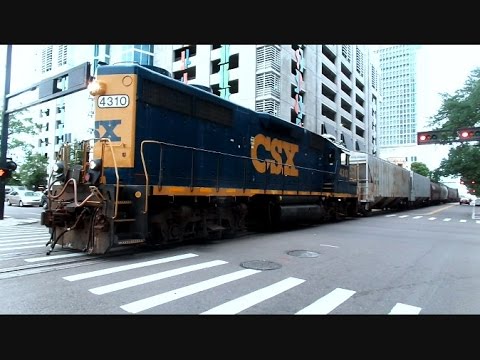 CSX Street Runner Freight Train In The Middle Of Downtown