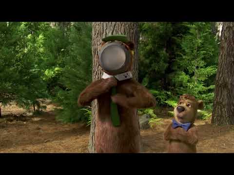Yogi Bear 2010 official trailer thumbnail with Yogi and Boo-Boo peeking from trees