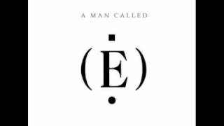 E - Looking Out the Window with a Blue Hat On