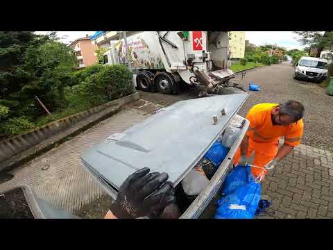 Riding Along with a Bin Man:  Hard Work