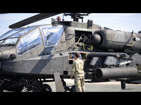Moments Before the Attack: AH-64D Apache in Full Combat Preparation