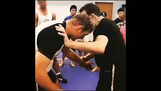 Effective Techniques for Setting Up a Rough Double Wristlock
