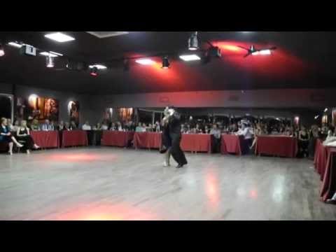  John Erban  and  Clarissa Sanchez  are  dancing  to  a  milonga