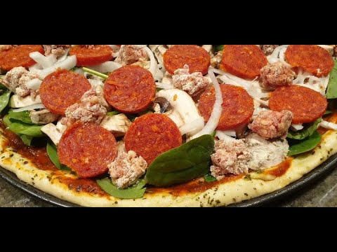 How to make delicious homemade pizza from scratch, including the dough. Taste better than take-out