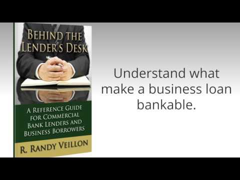 Behind the Lender's Desk  by R. Randy Veillon