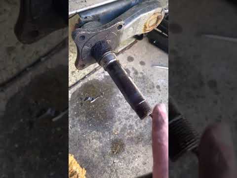Removing spindle from torsion axle