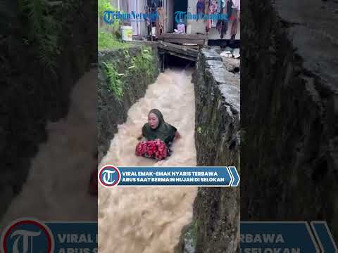 Viral: Mother Nearly Swept Away While Playing in the Rain in a Ditch