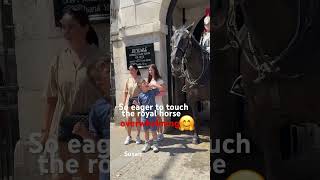 So eager to touch the horse. Overwhelming. #london #tourist #happy #horse #fun