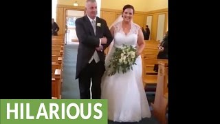 Kid dives onto back of bride's wedding dress during ceremony