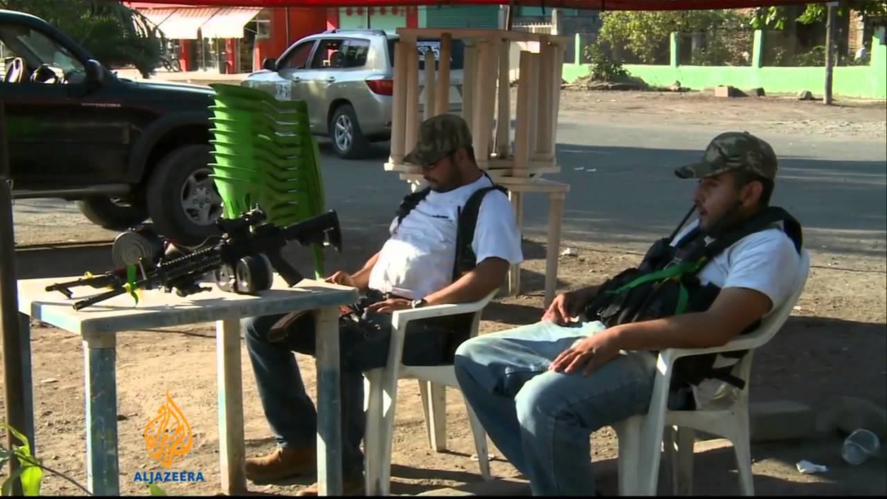 Mexico asks vigilantes to surrender weapons