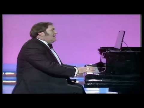 Les Dawson, playing the piano