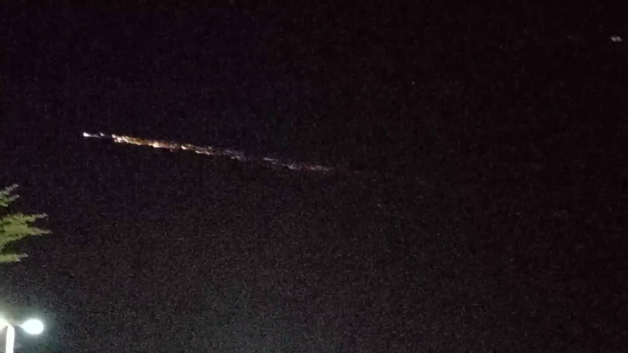 A Rocket Booster Falls Back to Earth