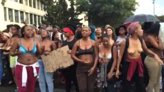 Download lagu Rhodes students form human barrier, protest topless against rape mp3