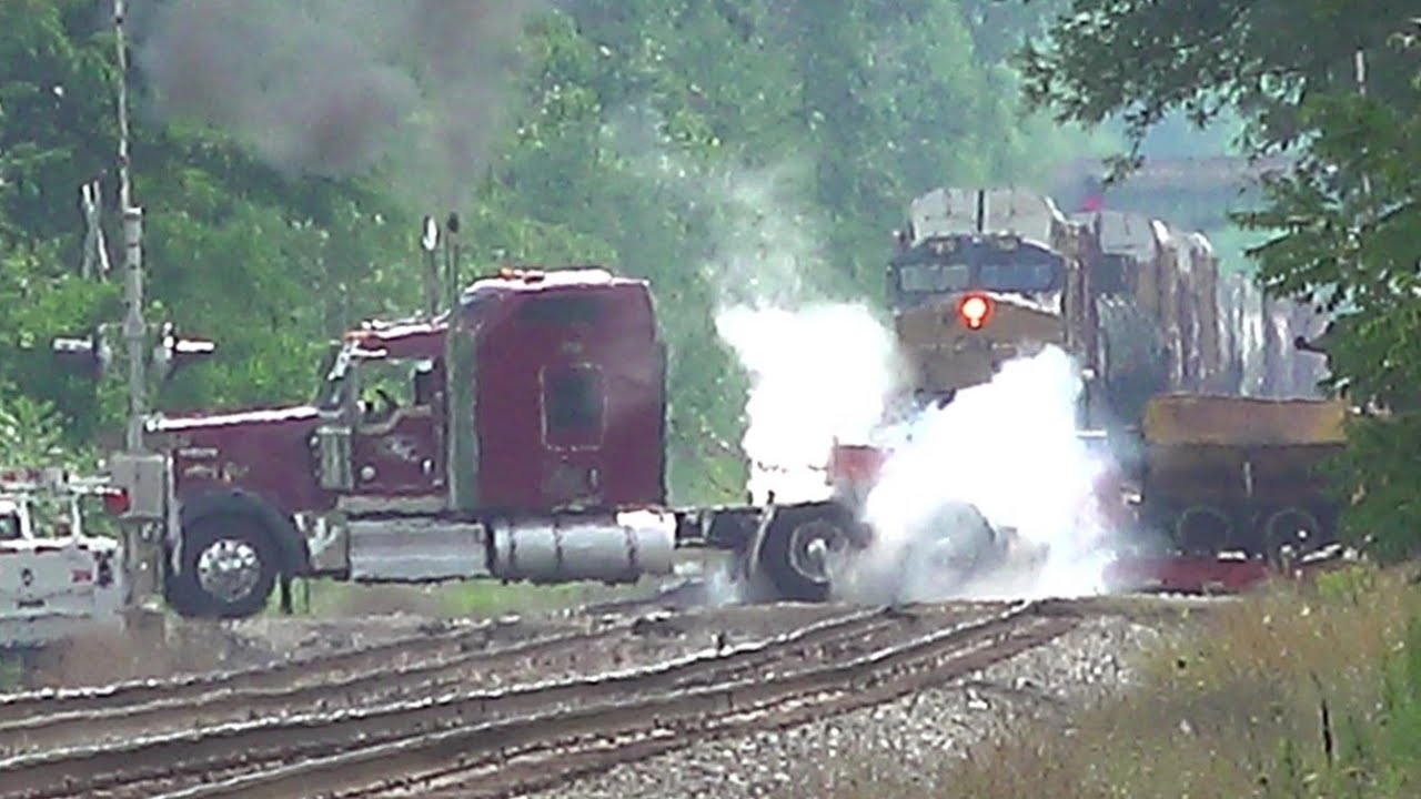 Semi Truck Stuck On Train Tracks With Train Coming! You Wont Believe This One!