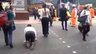 Man on a lead gets walked like a dog through London streets