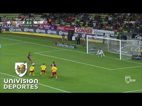 Lucero scores a goal! He scores a penalty for Xolos, fooling the Morelia goalkeeper.
