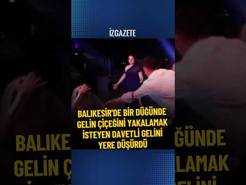 Balıkesir'de bir düğünde gelin çiçeğini yakalamak isteyen davetli gelini yere düşürdü #düğün