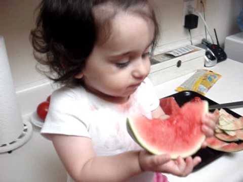 Nairi eating watermelon