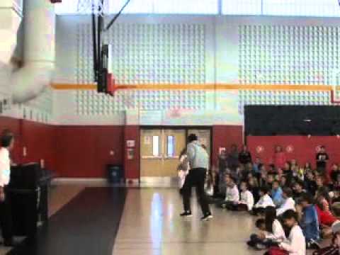 PJ Reed '17 Dunks at Elementary School Assembly