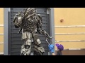 Kid gives Megatron Optimus Prime's head - happy Megatron