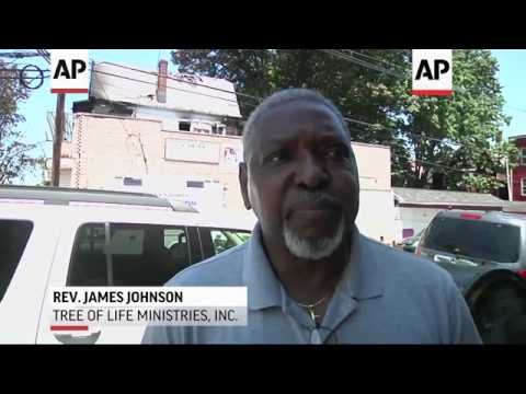 An acting county prosecutor says that plastic porch flowers acted as an accelerant in a fatal house