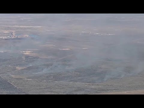 Grass fire contained but still burning in Atascosa County