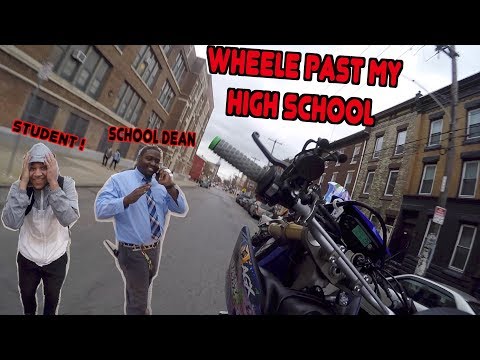 WHEELING A DIRTBIKE PASS MY HIGH SCHOOL !! | BRAAP VLOGS