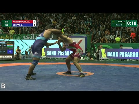 Round 2 FS - 86 kg: A. KARIMIMACHIA (IRI) df. D. DEEPAK (IND) by TF, 10-0