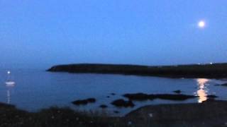 preview picture of video 'The Moon reflecting over Port of Ness bay, harbour & beach (July 2013) HD'