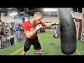 CALEB PLANT DRILLS HEAVY BAG WITH QUICK COMBINATIONS & SHOWS OFF FOOTWORK DURING HEAVY BAG WORKOUT