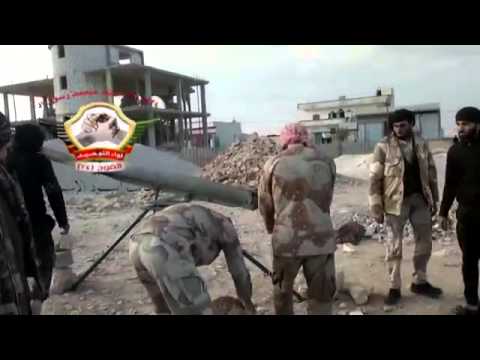 جولة لعناصر الجيش الحر  بعد السيطرة على مستودعات مهين في مدينة الرقة