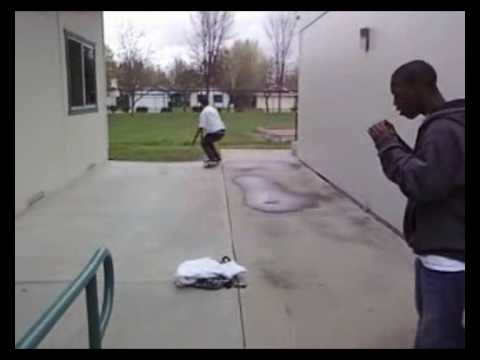 Skateboarder jumps over person and lands on board