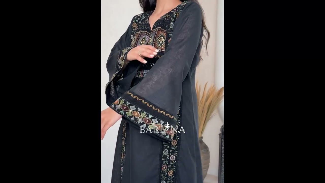 A soft black jalabiya with embroidered edges - XS