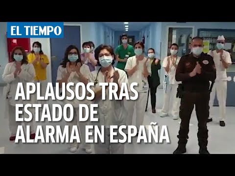 Aplausos desde las ventanas tras estado de alarma en España