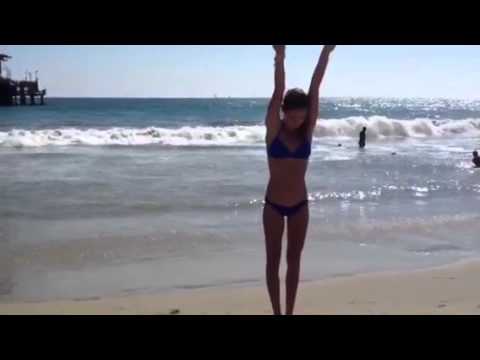 Back tuck on the beach