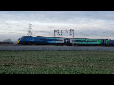 Colourful Avanti Pendolinos heading north (390119) & south (390121) near Nuneaton, 26th January 2022