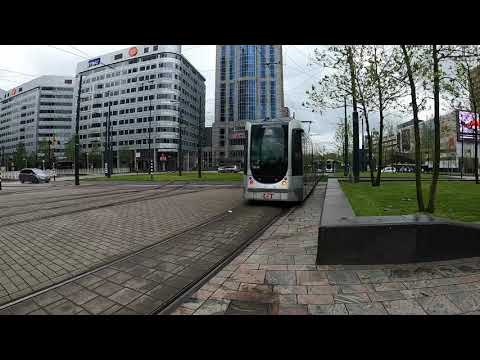 Tram 24 departs and Tram 7 arrives at Rotterdam Central Station