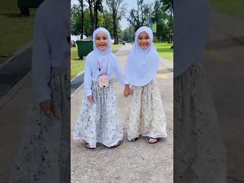 Afifa & Nasya,Jumping by the beach.