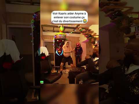 Kaaris aide Anyme à enlever son costume ...