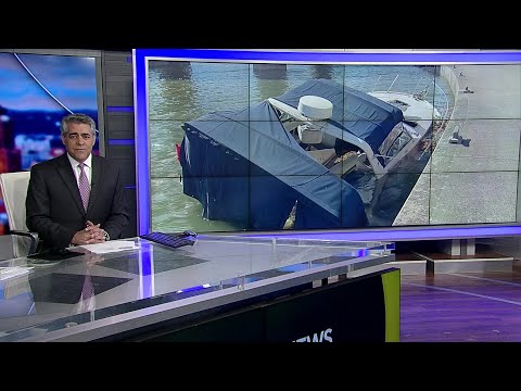 Crews removing sinking abandoned boat on North Shore