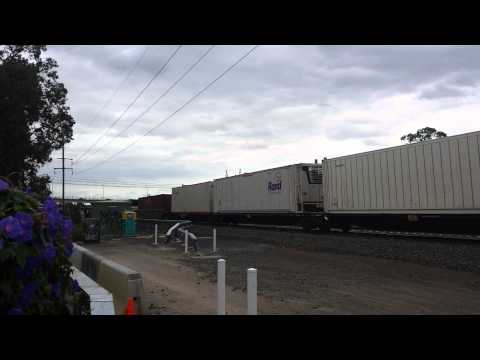 NR73/8120 overtakes AURIZON X54/42202 @ glenfield