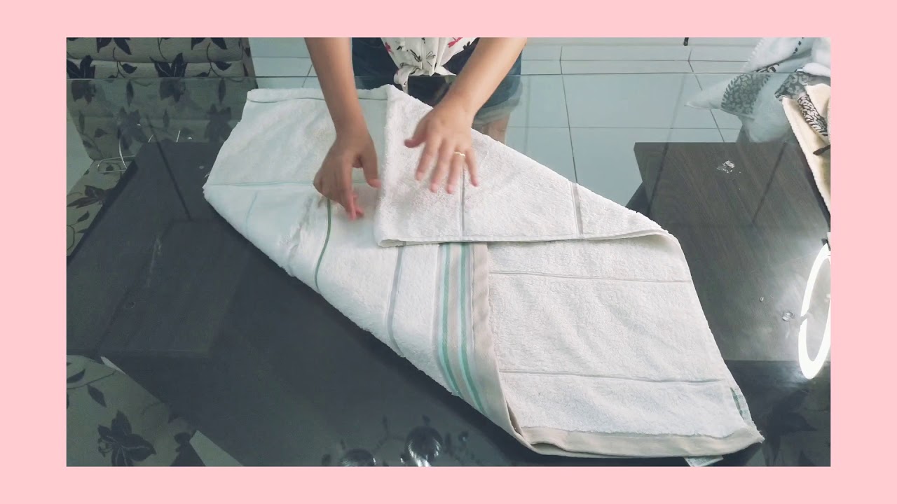 Como dobrar toalhas de banho