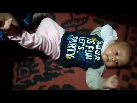 RUHINA WITH FATHER PLAYING