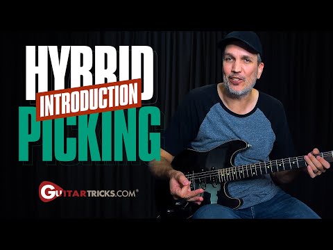 Hybrid Picking Explained | Guitar Tricks