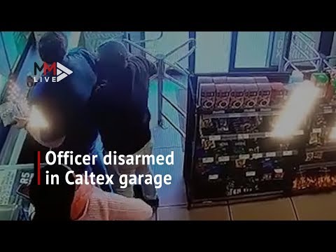 Shootout ensues after officer disarmed at Caltex garage