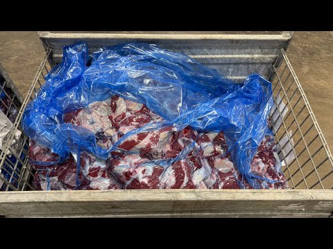 YouTube video: Bulk beef vacuum packaging in steel bins and wire containers