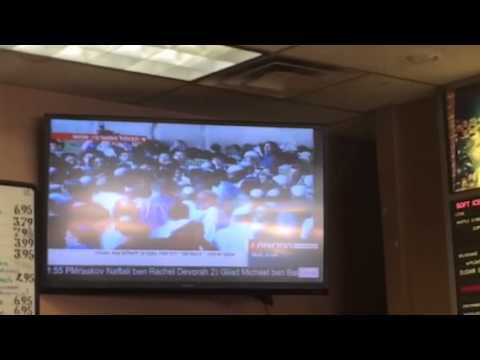 Israeli news on television at Bagel Nosh in Lakewood