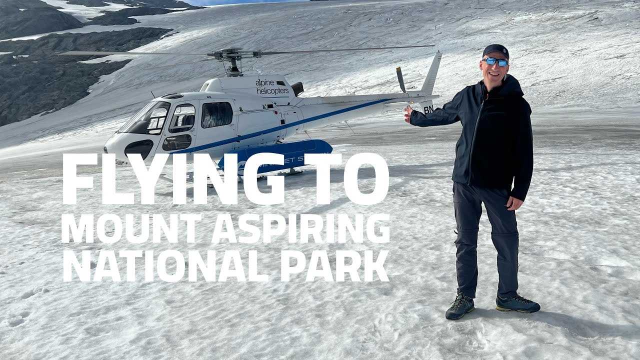 A traveler experiences adventurous Helicopter tour over Mount Aspiring & Glaciers.