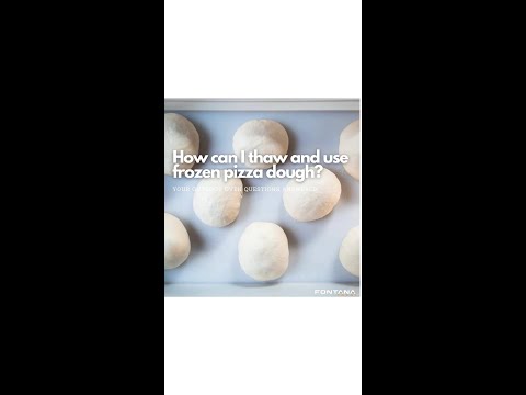 How can I thaw and use frozen pizza dough balls?