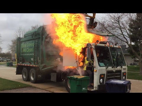 Garbage Truck Bursts Into Flames